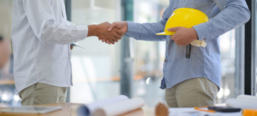 shaking hands with a contractor