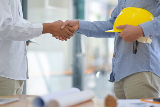 shaking hands with a contractor